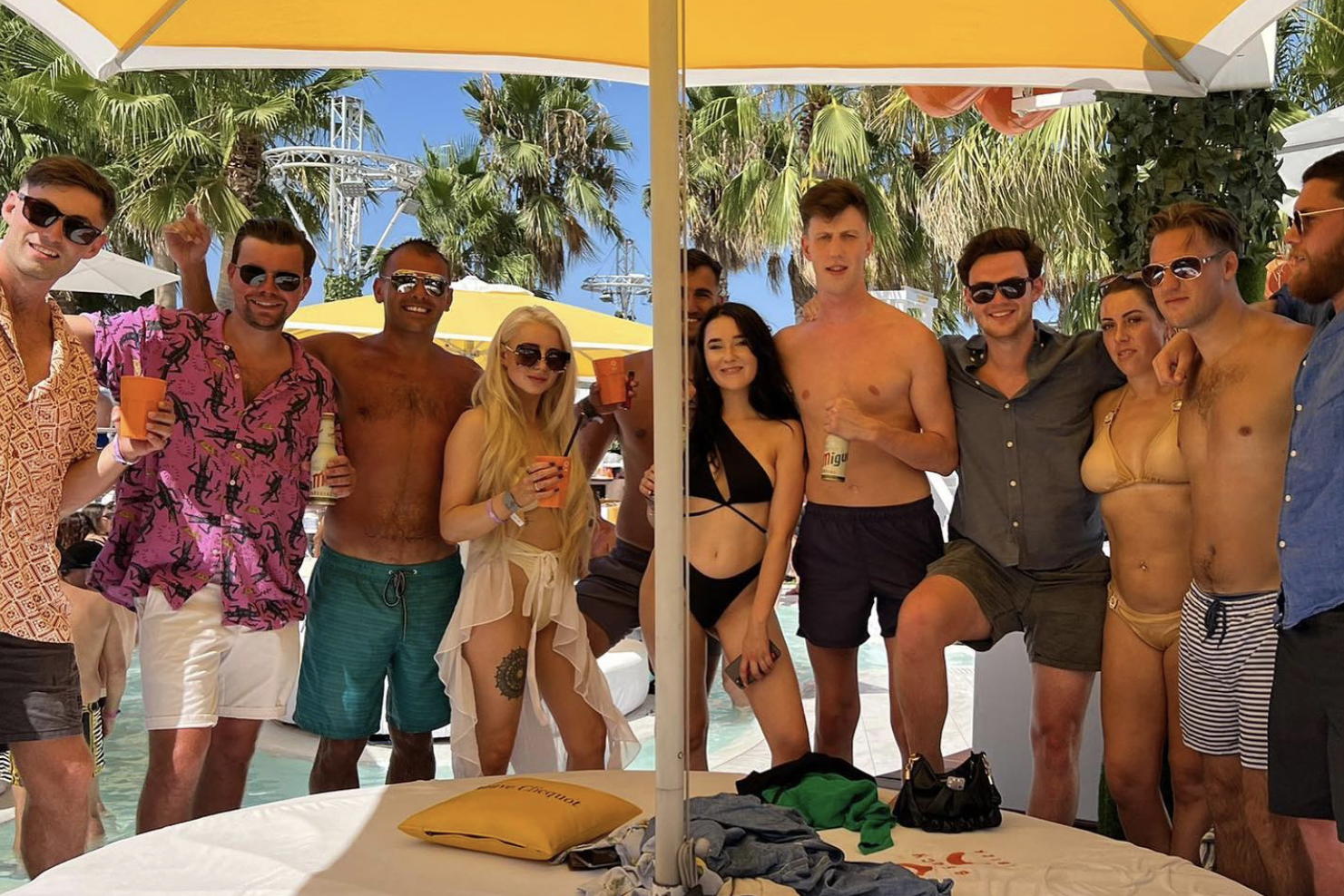The team chilling out together by the poolside in Ibiza